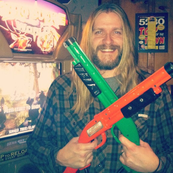 We met John, a local Denver musician, along with his lovely wife Becca at the Candlelight Tavern Saturday night. John, who plays guitar and bass, first grew his beard when he and Becca met (she made him do it; she's a good woman). He was both excited to be approached by Beards of Denver and bummed that he just had trimmed his awesome beard. John's favorite feature of his beard is the amazing white streak on the right side of it. John all we know is we love it all!