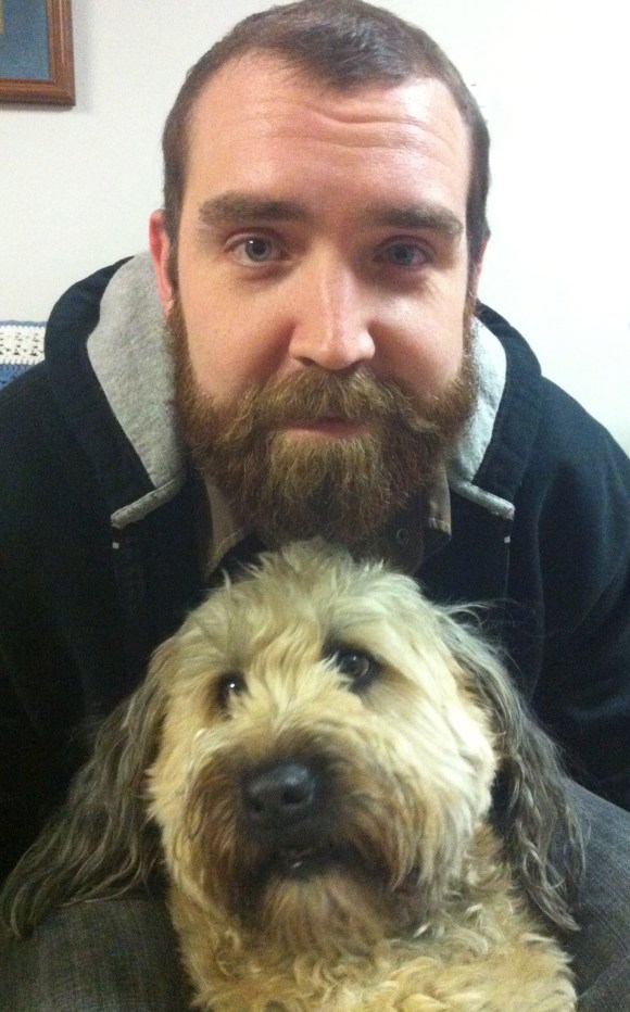 One-half of the Beards of Denver main cohort traveled to the amazing and ever-exciting state of South Dakota a few weeks ago to celebrate Christmas time, eat entirely too much food, and document a few beards while on location.  Mark not only sports an especially impressive beard, he's also the younger brother of one of the ladies behind BOD. Mark's been growing his beard the past few months, and is pictured here with the infamous Wheaten Terrier Daisy, who sports her own impressive beard, which she, like Mark, grows out during Beard Season.  While Mark resides in Sioux Falls, South D, he does make appearance in Denver, with his next to be sometime in the early half of 2013. When he's not busy grooming his beard, he's a connoisseur of Chicken Pot Pies. Keep up the great Beard work, Mark and  Daisy! 
