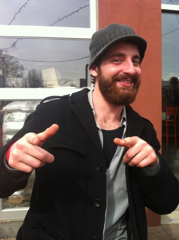 Fans of Beards of Denver, meet one of our favorite ginger beards thus far, Steve from Boulder! We were lucky enough to encounter Steve at the Beer and Bacon Breakfast at Denver Beer Company, where he was downing a few mugs of brew and showing off his amazing beard on a bright Saturday morning. Steve began growing his impressive beard on Halloween, when he went as Dexter (hence, the fear of the beard). He says his beard has acted as a superior face mask this winter while snowboarding, even though it often gets ice chunks stuck in it. Steve works at West End Tavern in Boulder while at the same time going to CU for psych and business; with that beard, we don't think he'll have any trouble navigating the business world once he graduates. Steve's been in Colorado for four years, and is originally from Chicago. With a beard like that, we hope he stays for good!