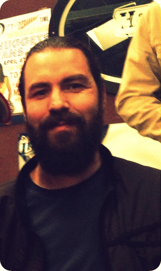 Hey Denvereenos! Meet Mr. Symm! We owe another huge 'thank you' to our lovely freelance beard huntress, Carrie, for her beard capturing skillz during a recent Gov's Park outing. It was at that fine establishment that she met Mr. Symm (or Sim? Sorry, buddy). Symm is a self taught architect and (similar to sweet Care-bear) does some freelance work of his own. This lover of traditional style design stays true to his art and maintains his beard in a classic style. Symm has a special lady that shares his sense of good taste--she's never experienced his naked chin! Lucky lady! Thanks for letting us capture your handsome mug, Symm!