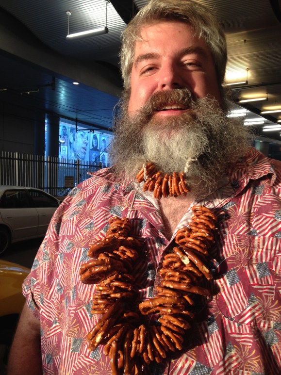 You're especially lucky today, Beards of Denver loyalists, because we're bring you a beard that will make you breathe easier--literally and figuratively.  We met Mark while we were awaiting entry into the Great American Beer Festival in October, and we couldn't have been more pleased to make his acquaintance.  Mark started this version of his great beard journey in October of 2012 when he lost his job, but he's had a beard the better part of the past 12 years. As you can expect, Mark is quite the wise man.  Mark, who now works at the Pima Medical Institue teaching in the Respiratory Therapy department, has been growing his beard ever since he started the gig there last year, and his boss is one of his biggest supporters.  His wife and daughter, however, are not fans of his beard, which, of course, we find astonishing.  Mark says that doesn't deter his dedication to his beard growth, it just means a little less lovin' from his sweetheart.  Mark said his wife wouldn't help him braid the pretzels into his beard as a form of protest, but even with her dislike of his manly mane, their marriage is going on 14 years strong.  Mark, who lives in Highlands Ranch, says he gets lots of comments on his beard, especially from other bearded brothers "It's like a beard fraternity" he told us. One we'd proudly pledge!  Thanks Mark! we hope all those pretzels came in handy at GABF!